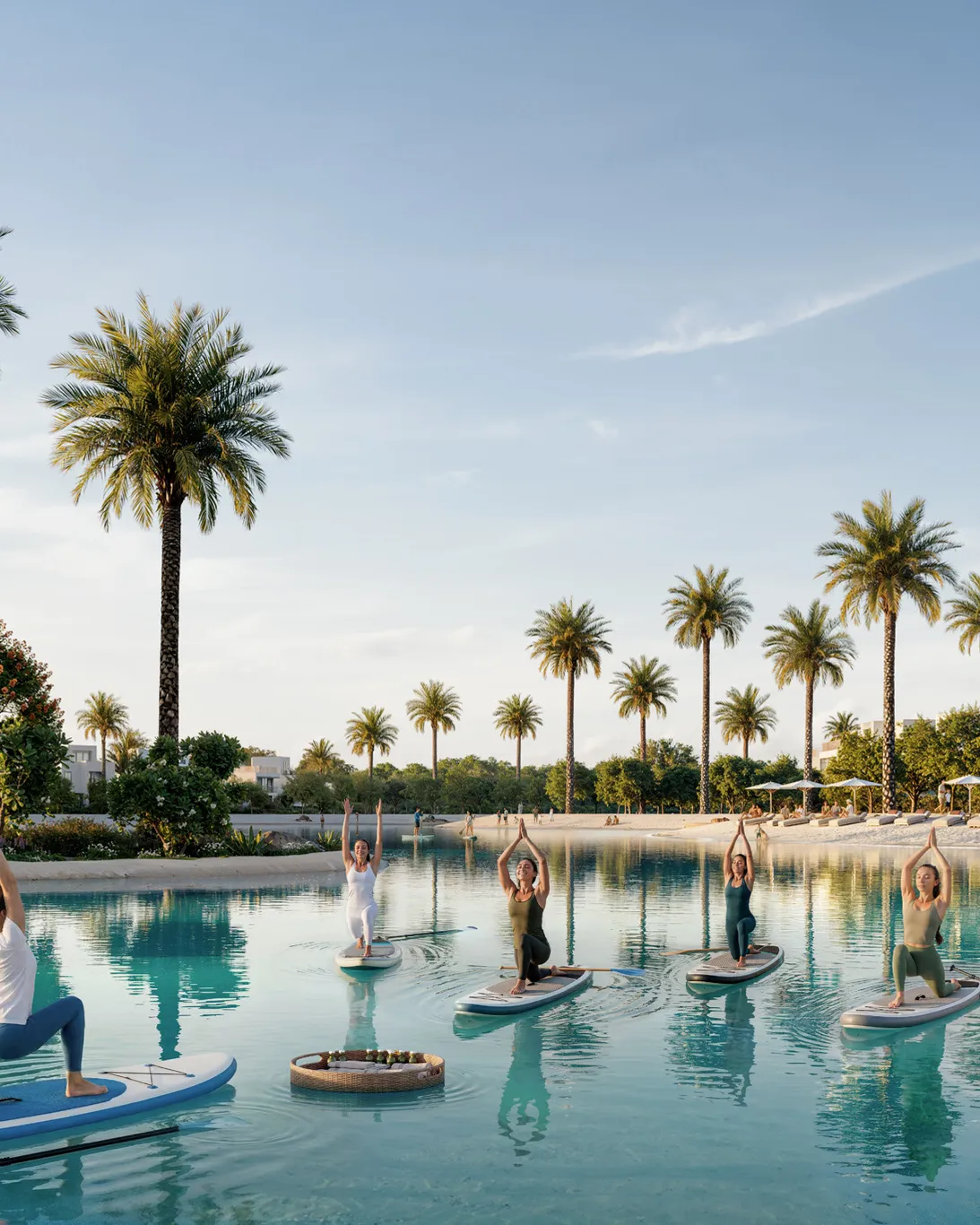 Paddleboard yoga on the palm-fringed lake beside the beach