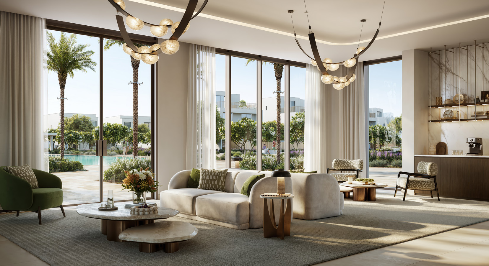 Lounge with sculptural chandeliers and tall windows onto gardens